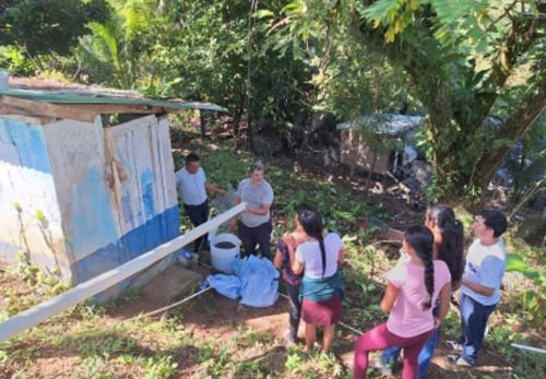 Young-students-actively-participating-in-a-greywater-filtration-workshop